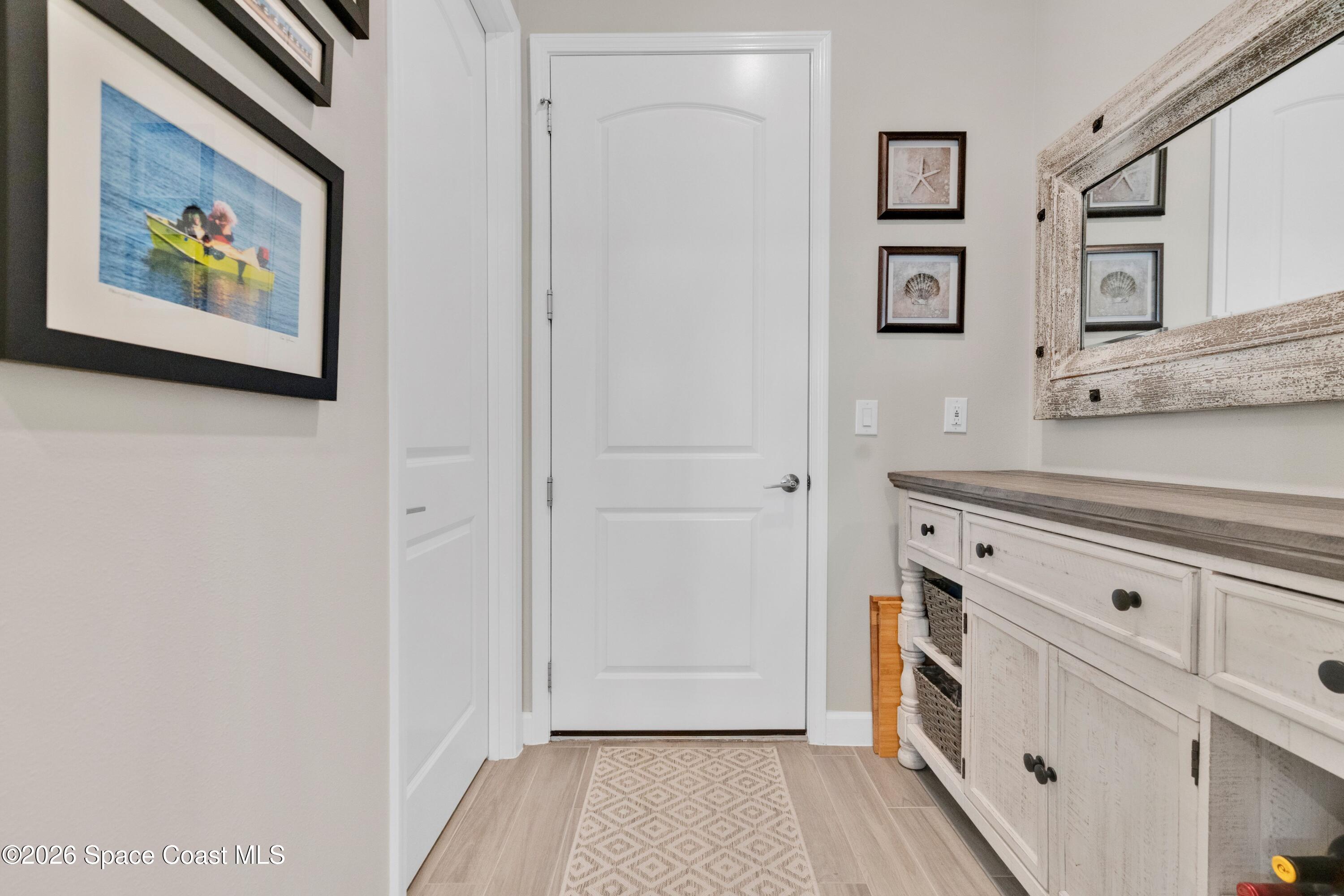 2819 Millennium Circle Melbourne, FL 32940 - Photo 21 of 39 a view of cabinets with wooden floor
