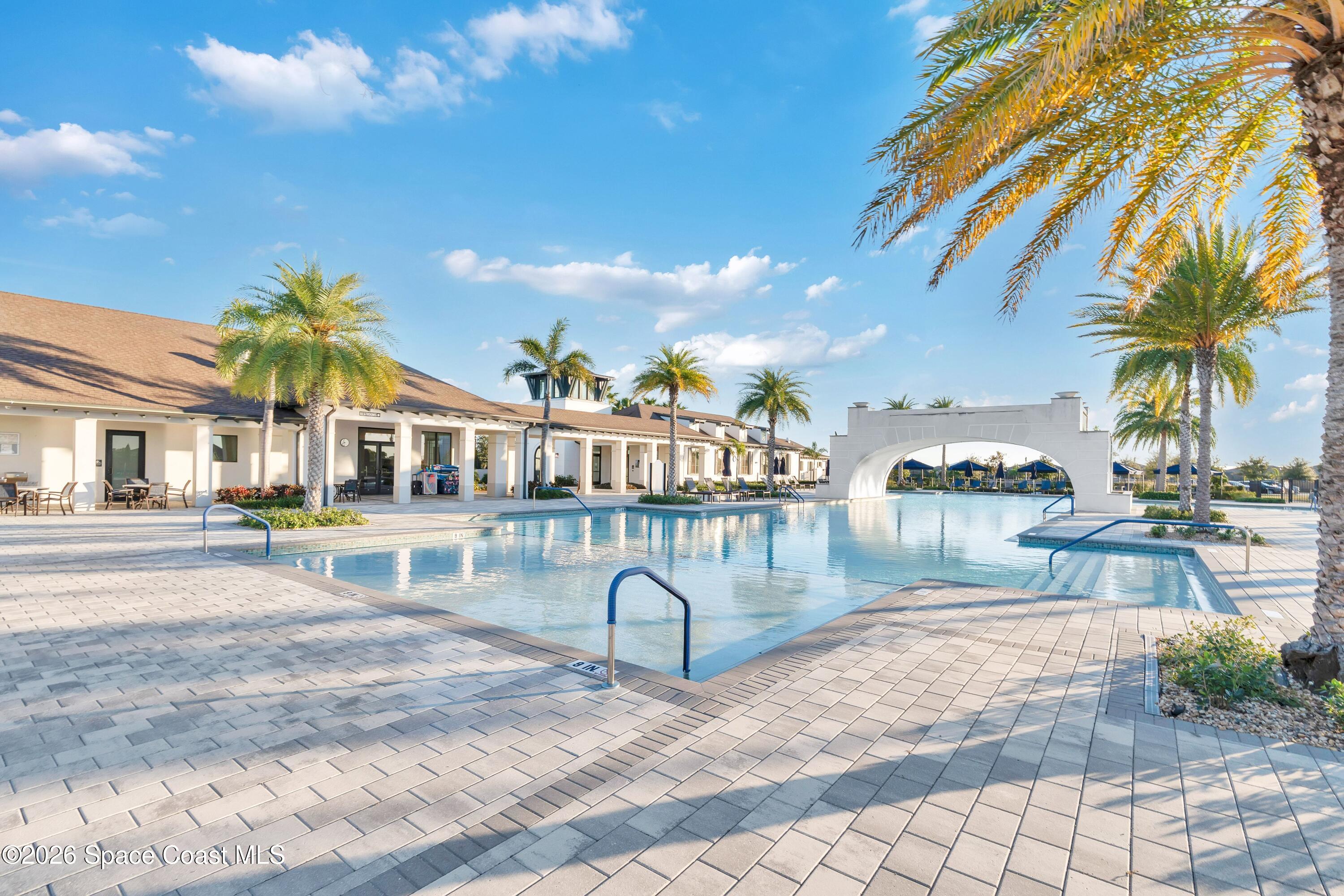 2819 Millennium Circle Melbourne, FL 32940 - Photo 28 of 39 a view of a house with a swimming pool