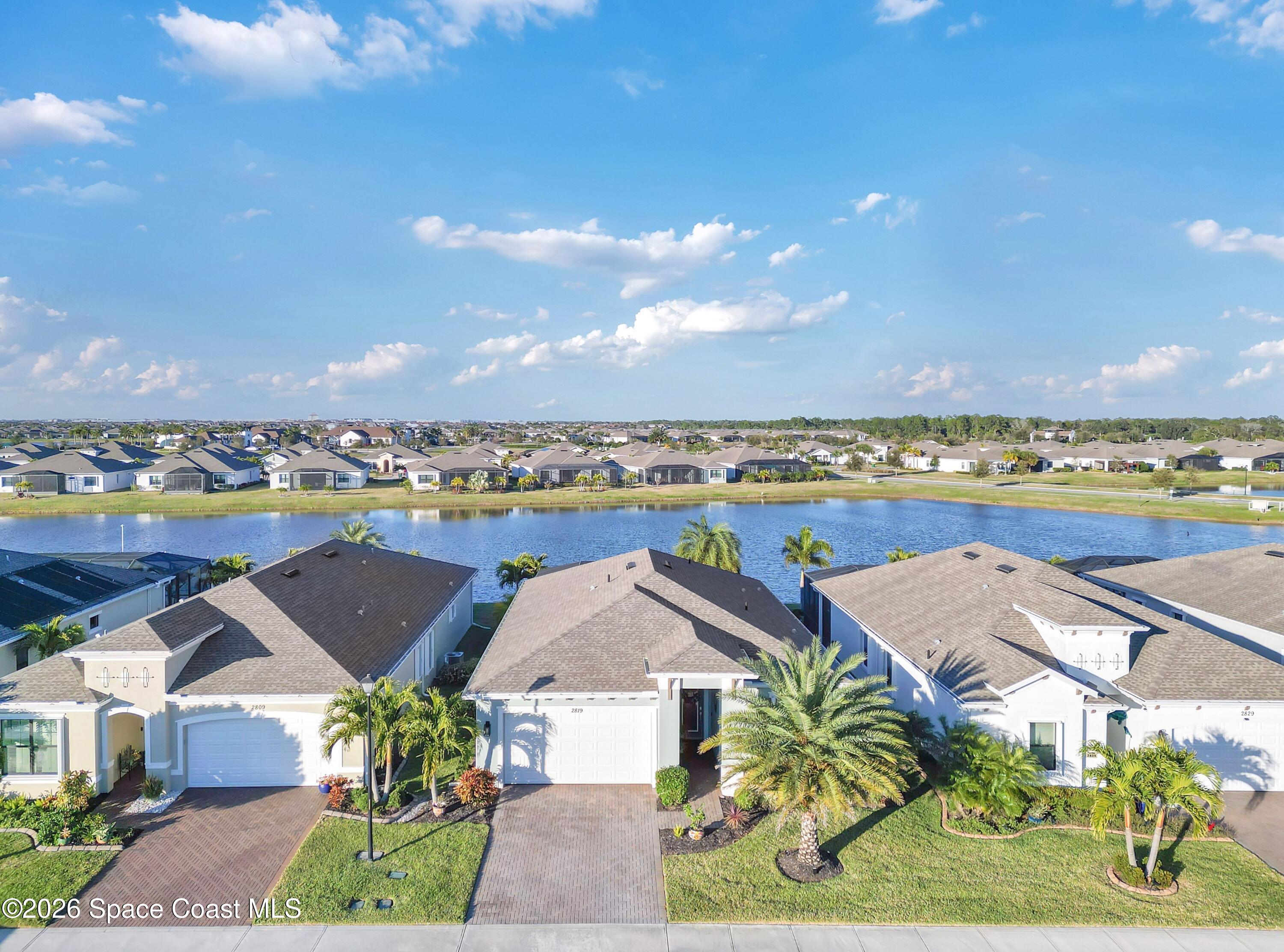 2819 Millennium Circle Melbourne, FL 32940 - Photo 32 of 39 a view of a city with lawn chairs
