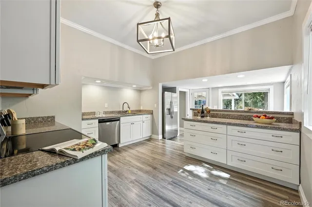 a dining room with furniture and windows