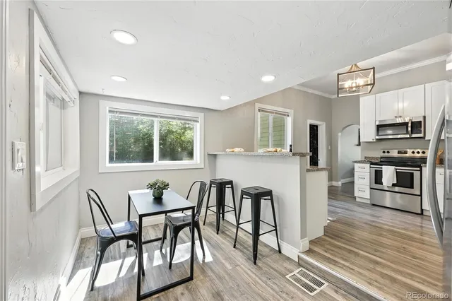 a bathroom with a bathtub and a sink