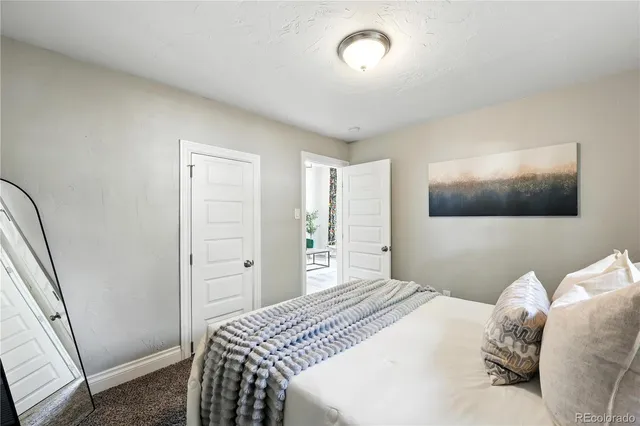 a living room with furniture and a window with outer view