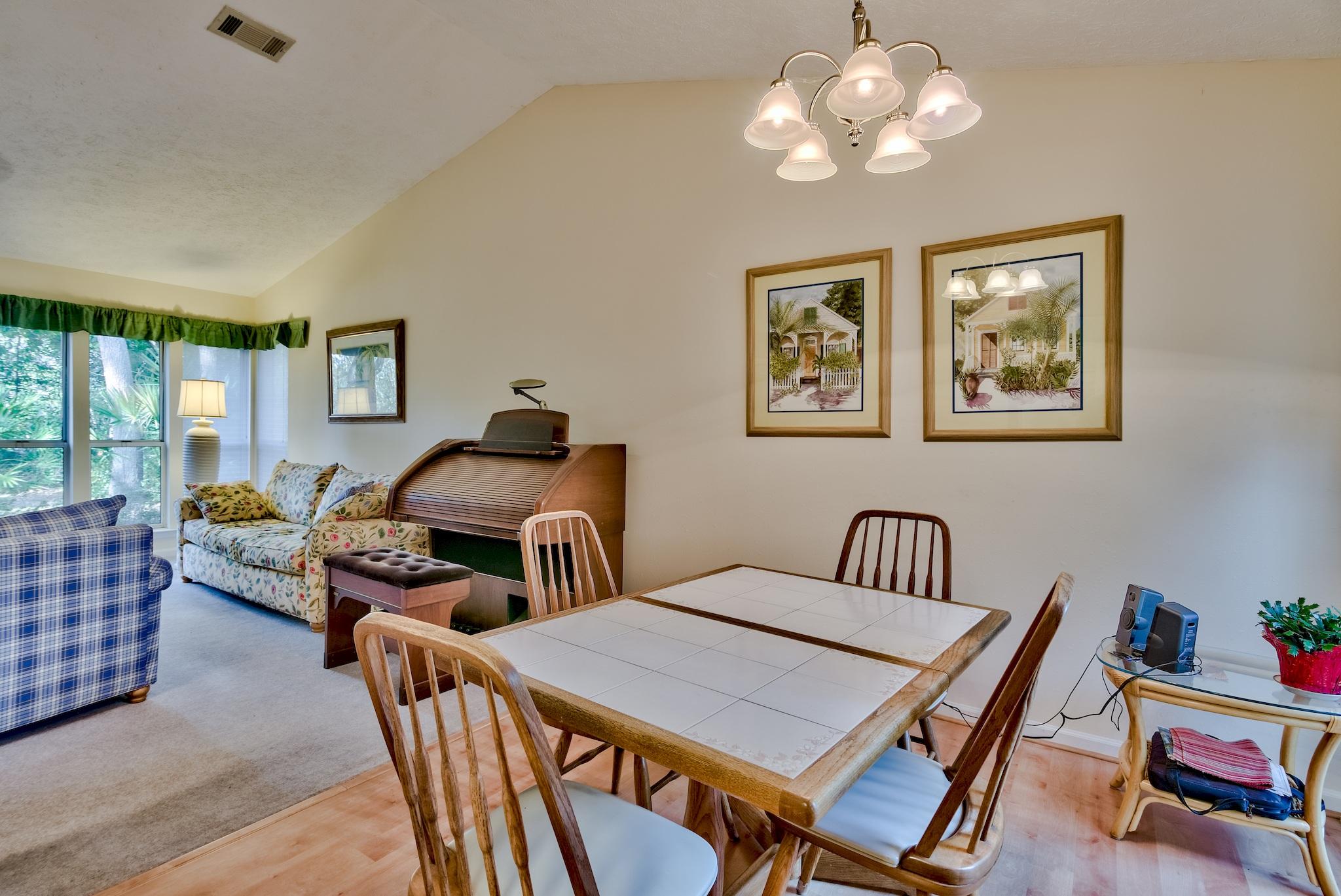 74 South Camp Creek Rd Inlet Beach Inlet Beach, FL 32461 - Photo 12 of 26 a bedroom with furniture and a chandelier