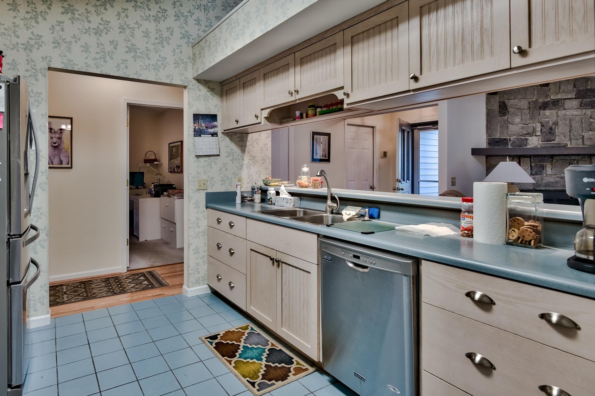 74 South Camp Creek Rd Inlet Beach Inlet Beach, FL 32461 - Photo 14 of 26 a kitchen with stainless steel appliances granite countertop a sink stove and cabinets