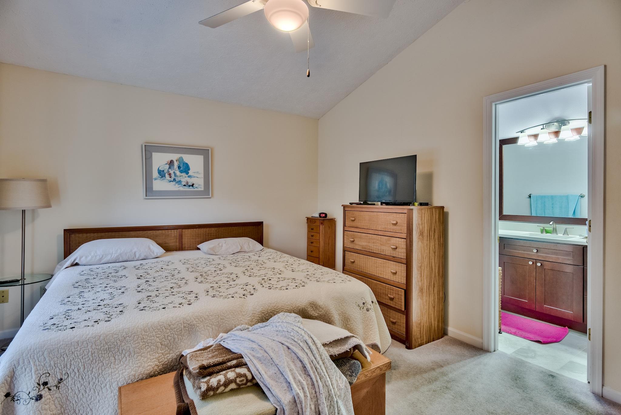 74 South Camp Creek Rd Inlet Beach Inlet Beach, FL 32461 - Photo 17 of 26 a bedroom with a bed and a flat screen tv