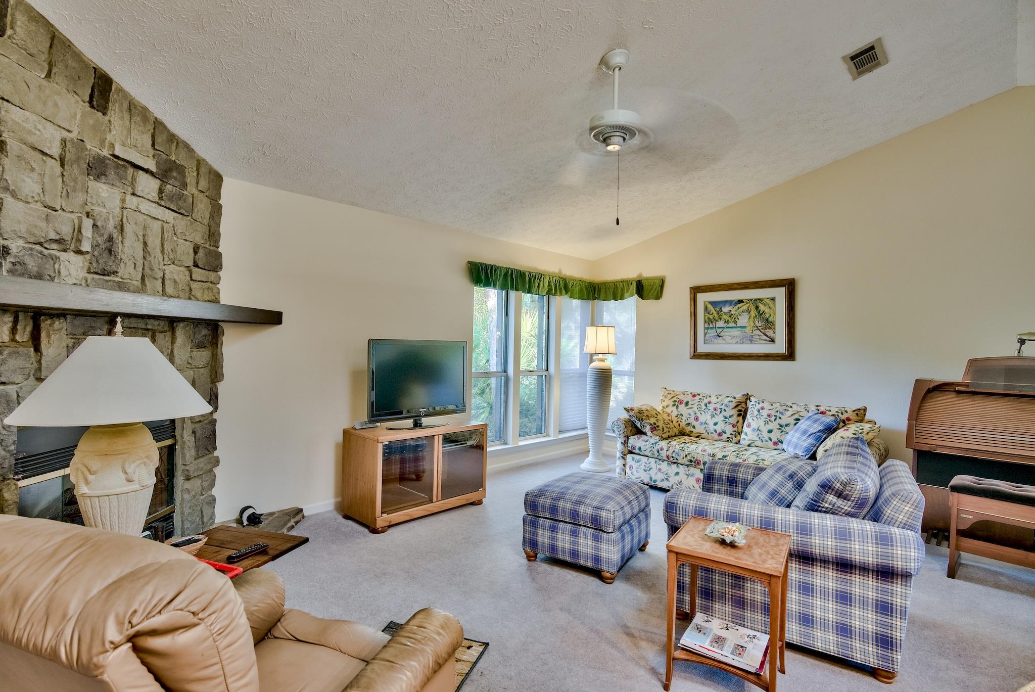 74 South Camp Creek Rd Inlet Beach Inlet Beach, FL 32461 - Photo 3 of 26 a bedroom with furniture and a lamp