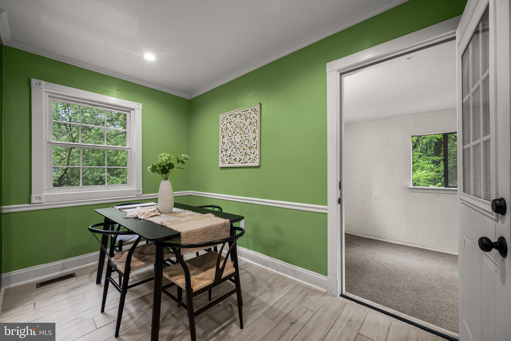 10902 Hammond Drive Laurel, MD 20723 - Photo 16 of 48 a view of a dining room with furniture and a window