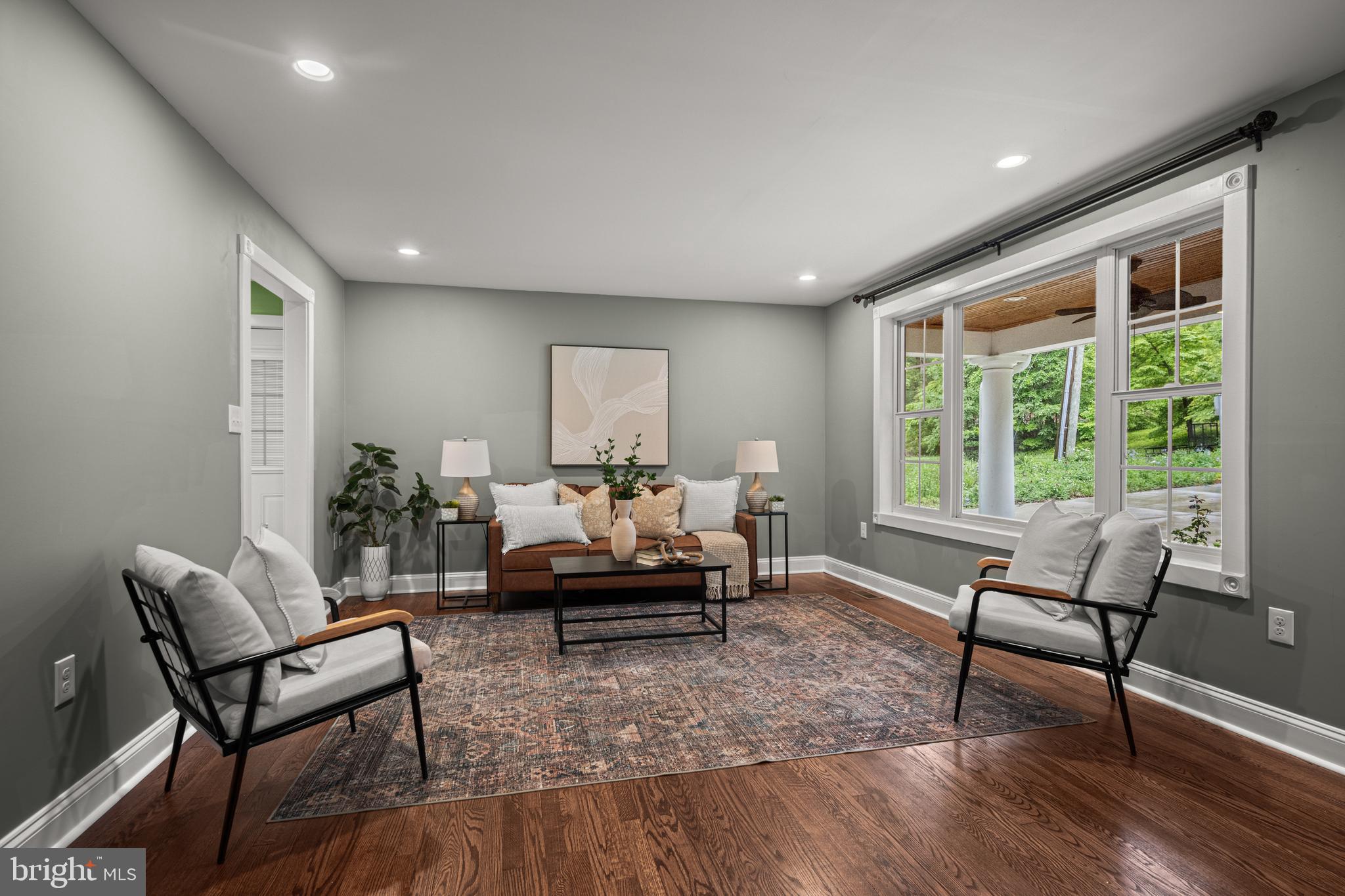 10902 Hammond Drive Laurel, MD 20723 - Photo 18 of 48 a living room with furniture and a wooden floor
