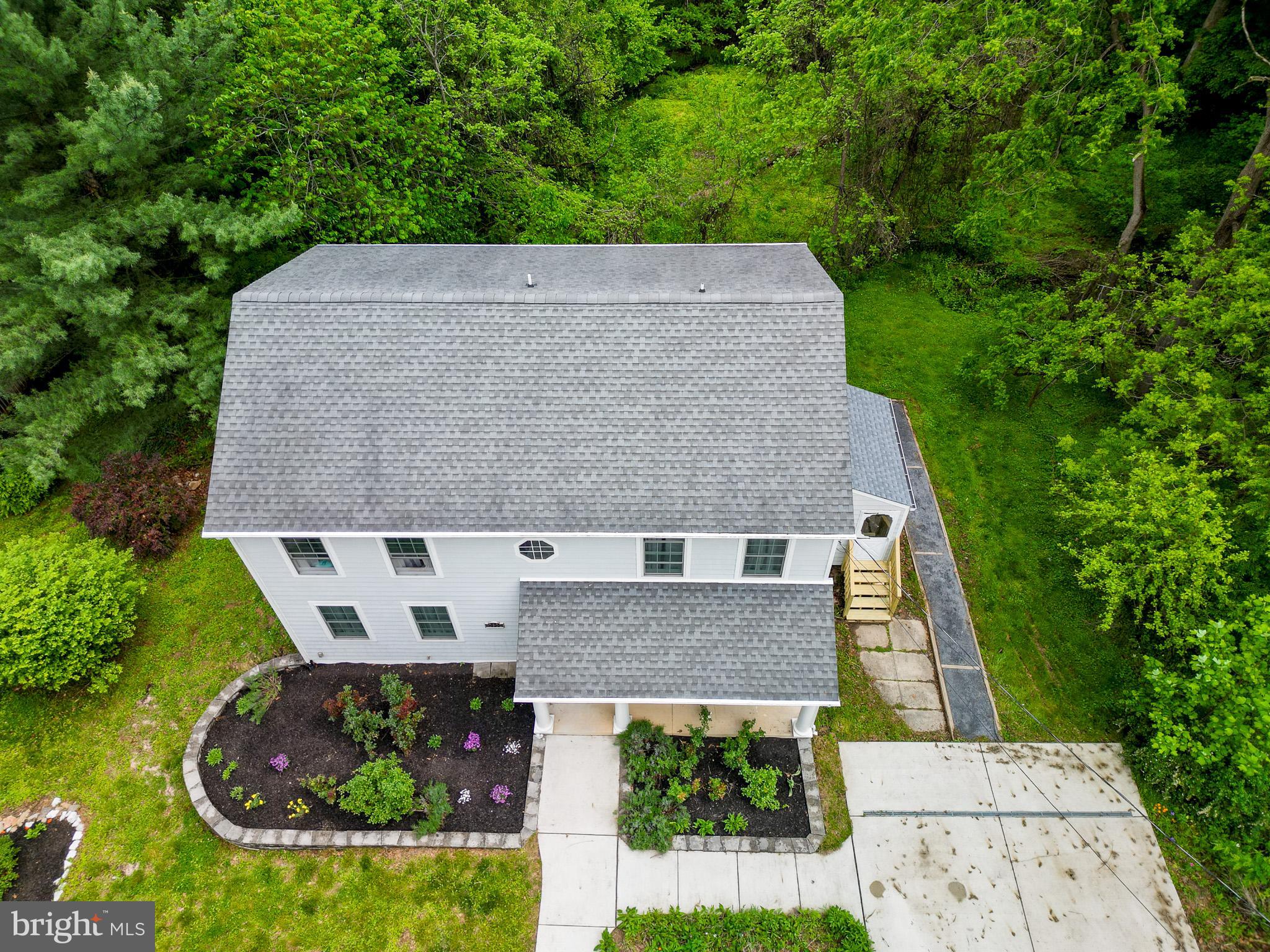 10902 Hammond Drive Laurel, MD 20723 - Photo 31 of 48 an aerial view of a house with garden space and street view