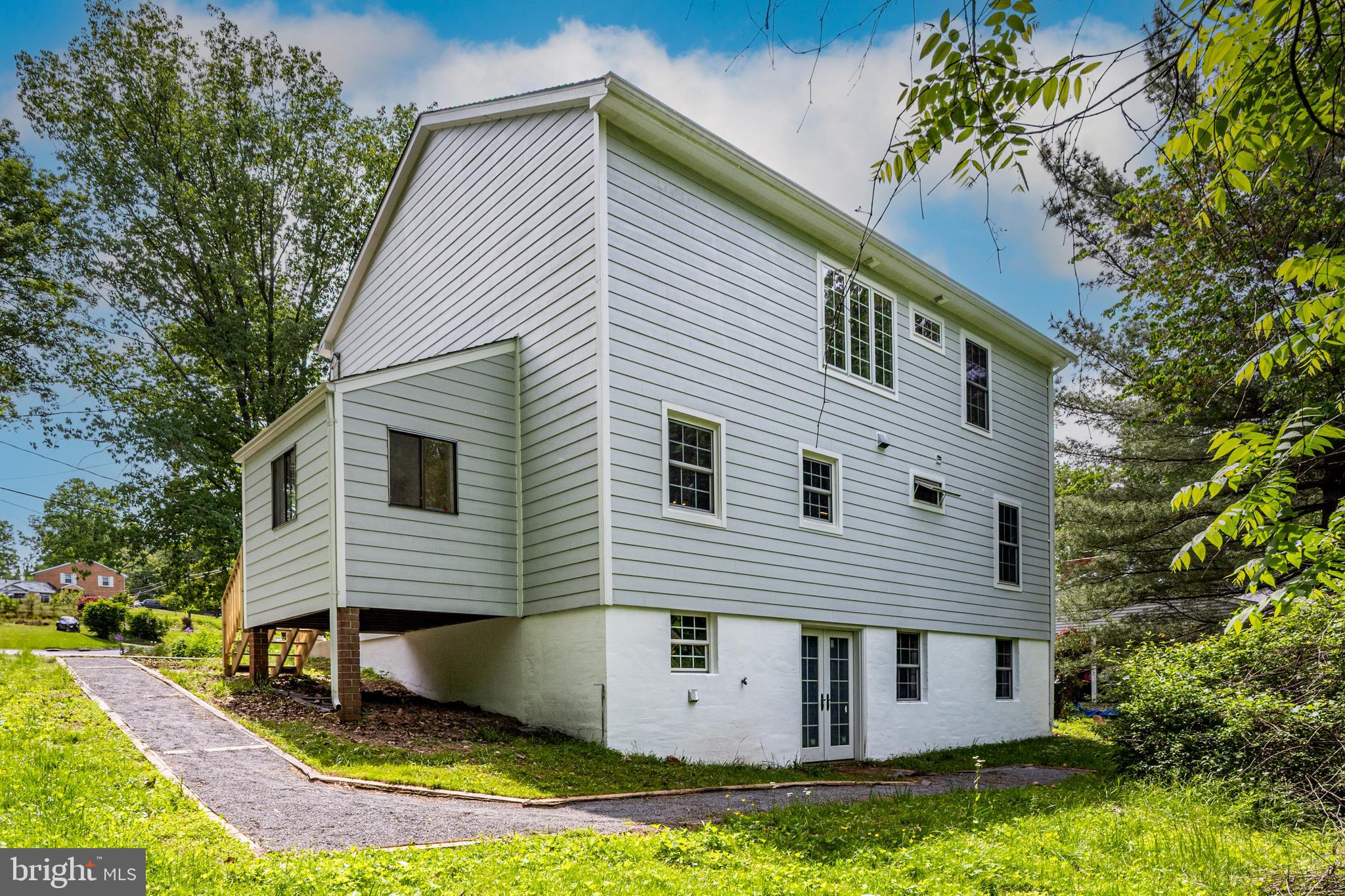 10902 Hammond Drive Laurel, MD 20723 - Photo 42 of 48 a view of a house with a yard