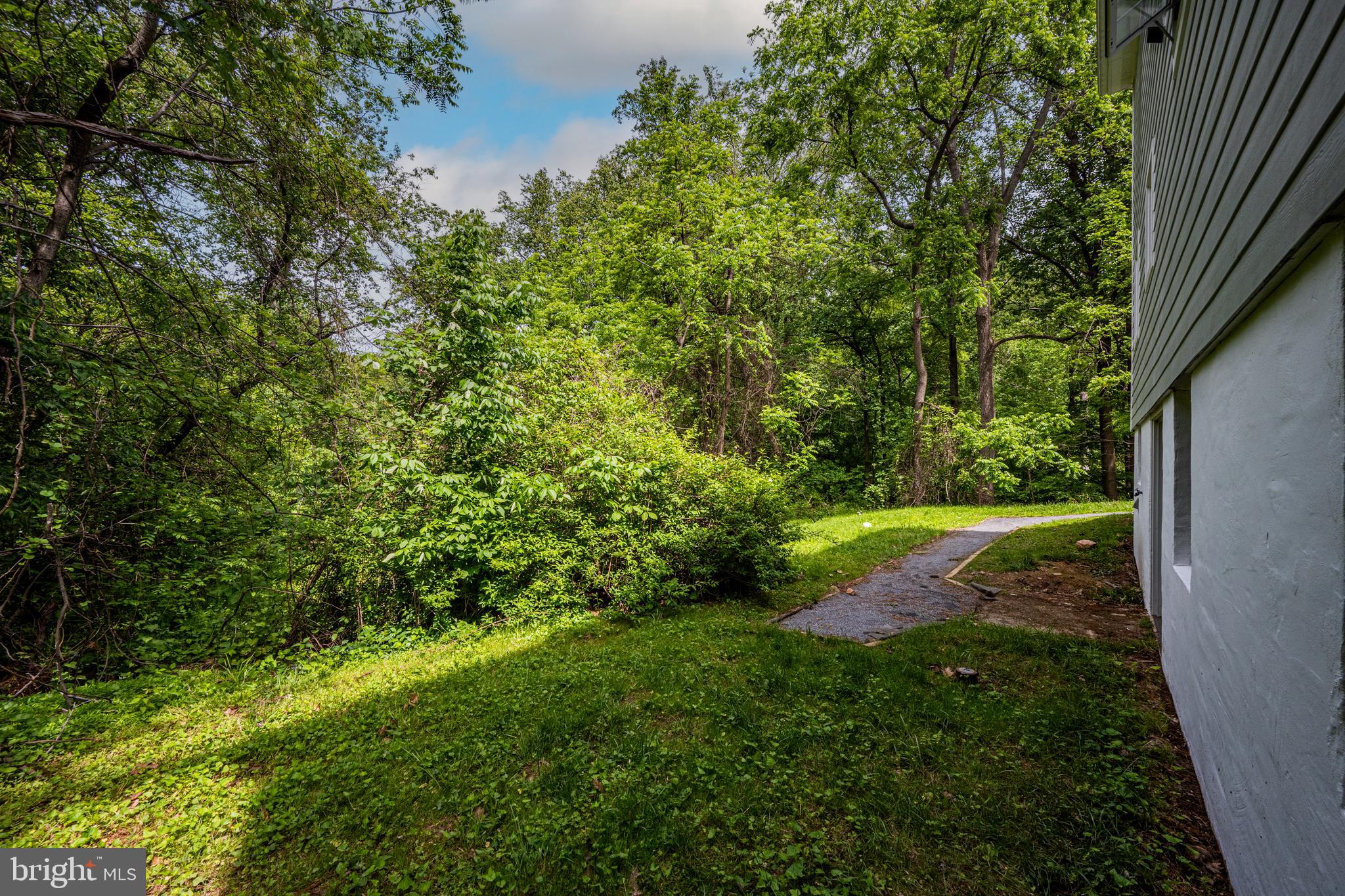 10902 Hammond Drive Laurel, MD 20723 - Photo 44 of 48 a view of yard with green space
