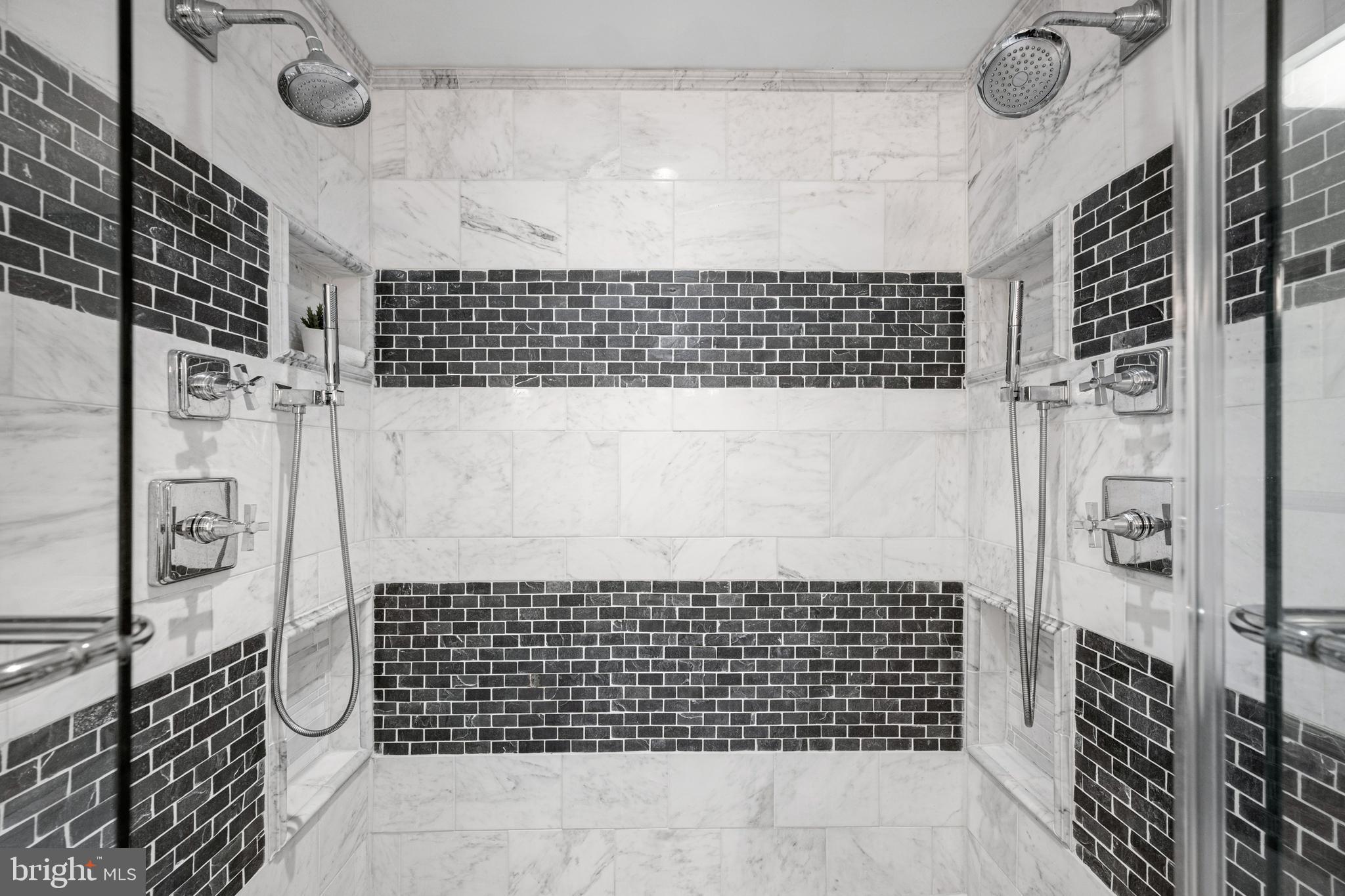 10902 Hammond Drive Laurel, MD 20723 - Photo 6 of 48 a bathroom with a shower