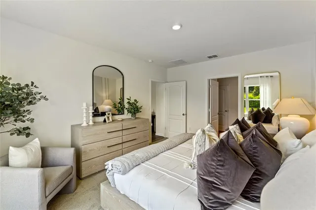 a bathroom with a double vanity sink mirror and shower