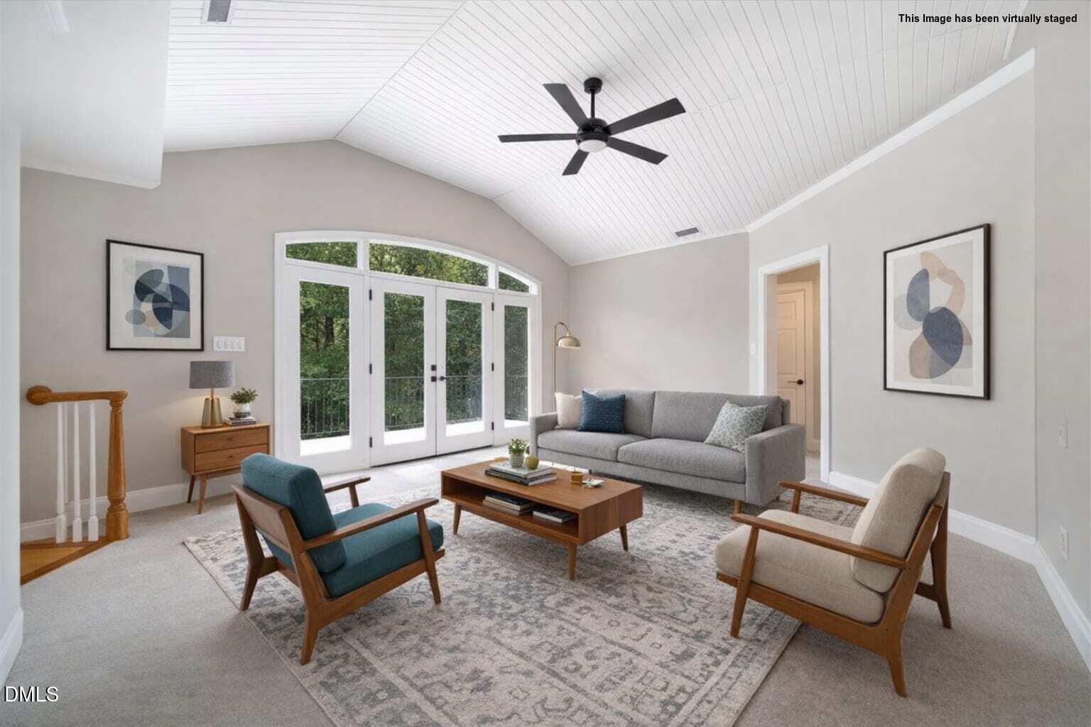 6300 Swallow Cove Lane Raleigh, NC 27614 - Photo 49 of 67 a living room with furniture and a large window