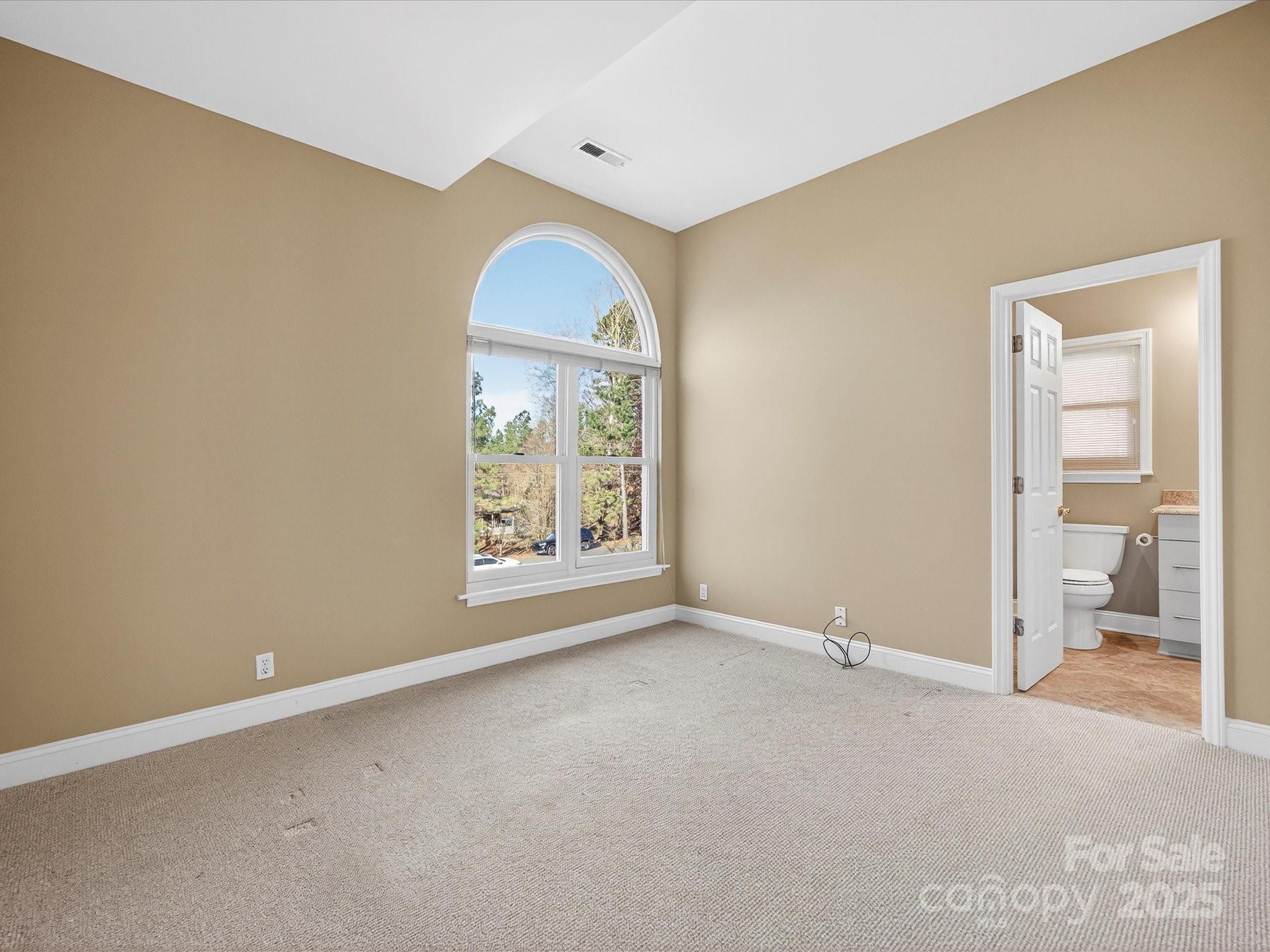 153 Collingswood Road Mooresville, NC 28117 - Photo 13 of 28 an empty room with windows