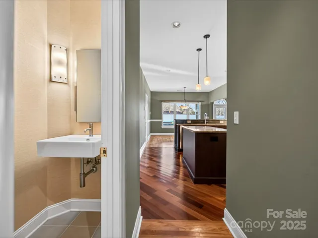 a view of a kitchen from the hallway