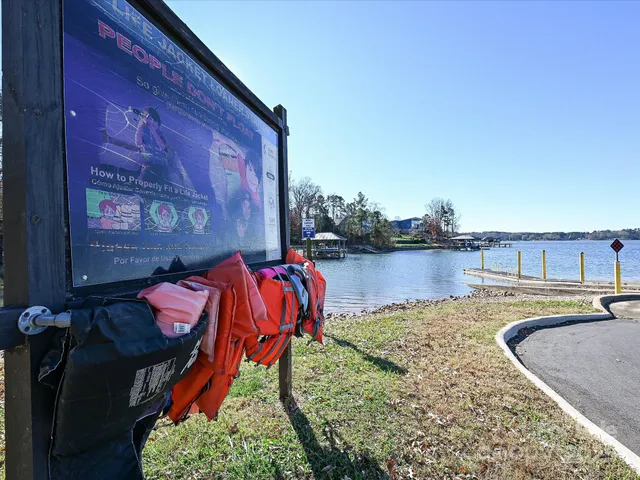 a view of a swimming pool with an outdoor space and seating area