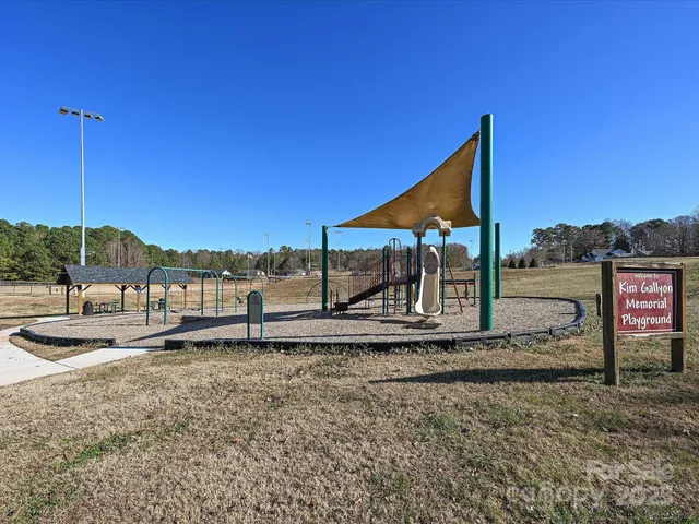 a house view with a backyard space