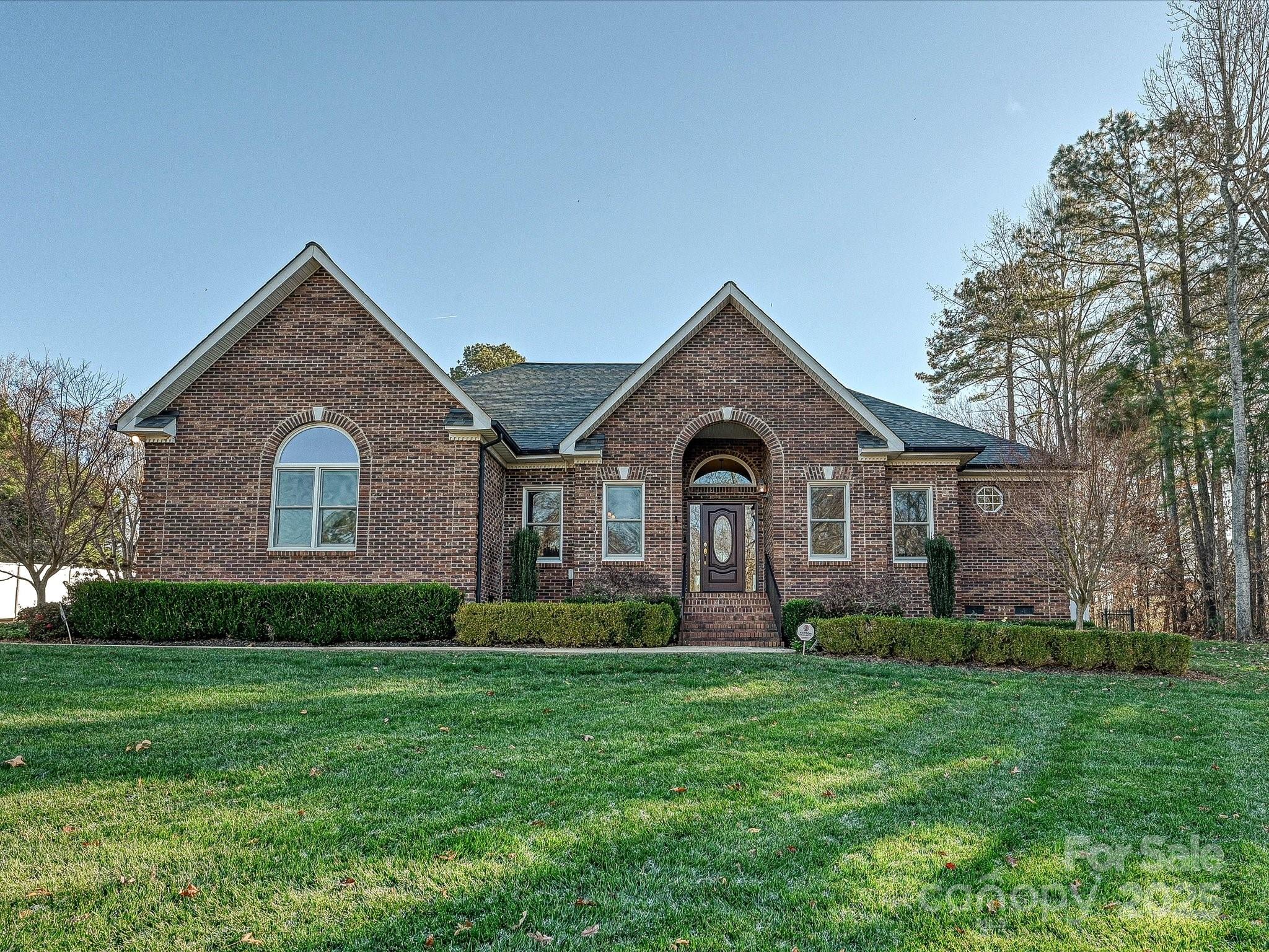 153 Collingswood Road Mooresville, NC 28117 - Photo 28 of 28 a front view of a house with a yard