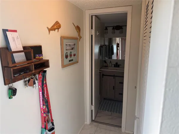 a view of a hallway with workspace and a hallway