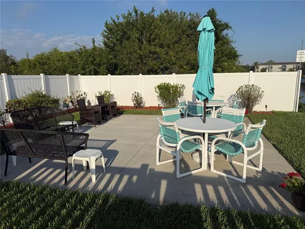 a view of an outdoor space with furniture