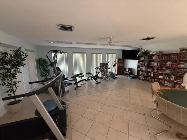 a view of a room with gym equipment