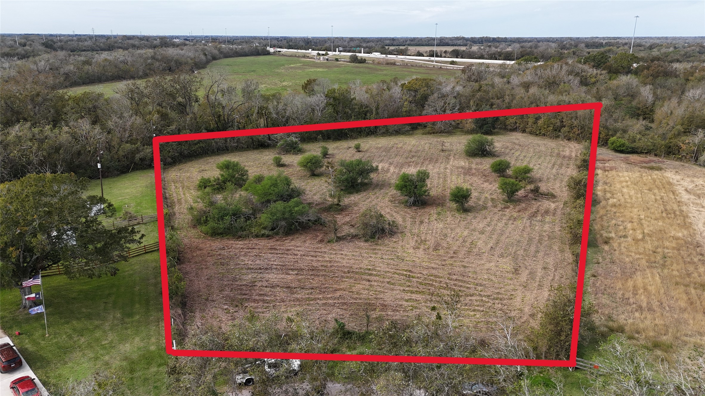 0 Elberta Lane Brookshire, TX 77423 - Photo 4 of 10 a view of water with a small yard and large trees