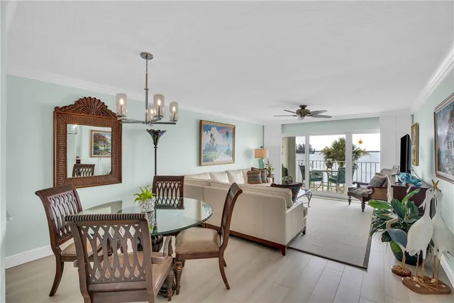 a view of a livingroom with furniture window and wooden floor