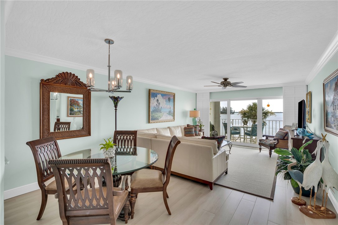 5914 South River Run Drive, Unit 5914 Sebastian, FL 32958 - Photo 16 of 36 a view of a livingroom with furniture window and wooden floor