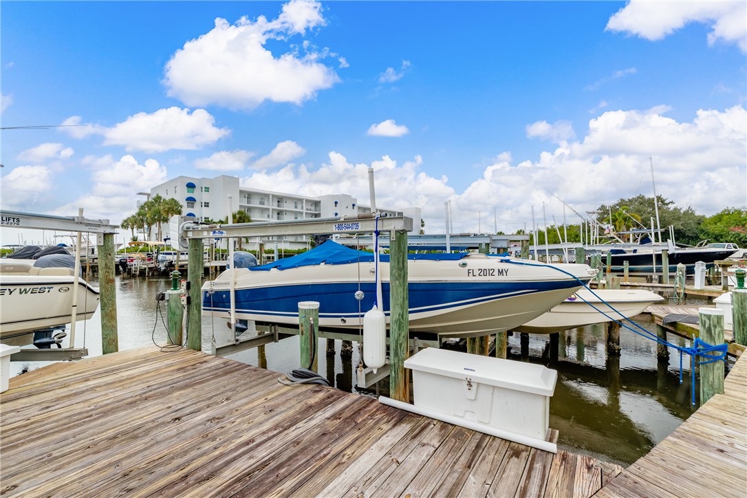 5914 South River Run Drive, Unit 5914 Sebastian, FL 32958 - Photo 33 of 36 a view of a rooftop deck with couch and chairs