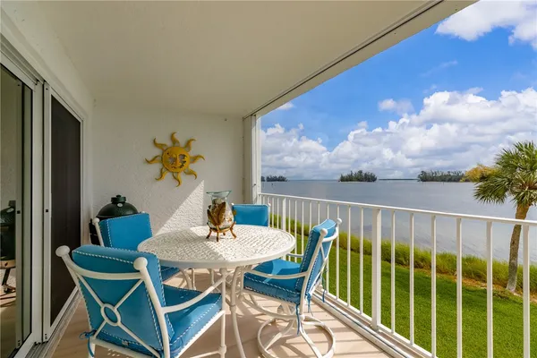 a view from deck having patio