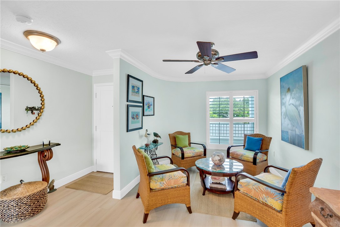 5914 South River Run Drive, Unit 5914 Sebastian, FL 32958 - Photo 10 of 36 a living room with furniture and a window