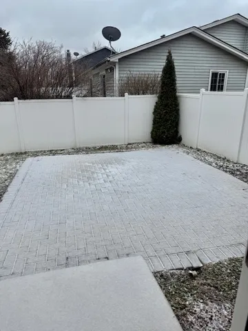 a house with trees in the background
