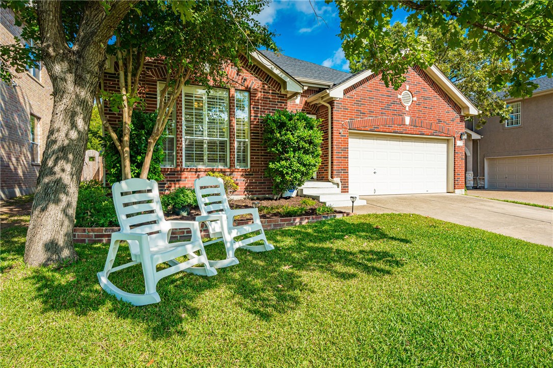 1618 Sundown Drive Austin, TX 78738 - Photo 1 of 1 a front view of a house with garden
