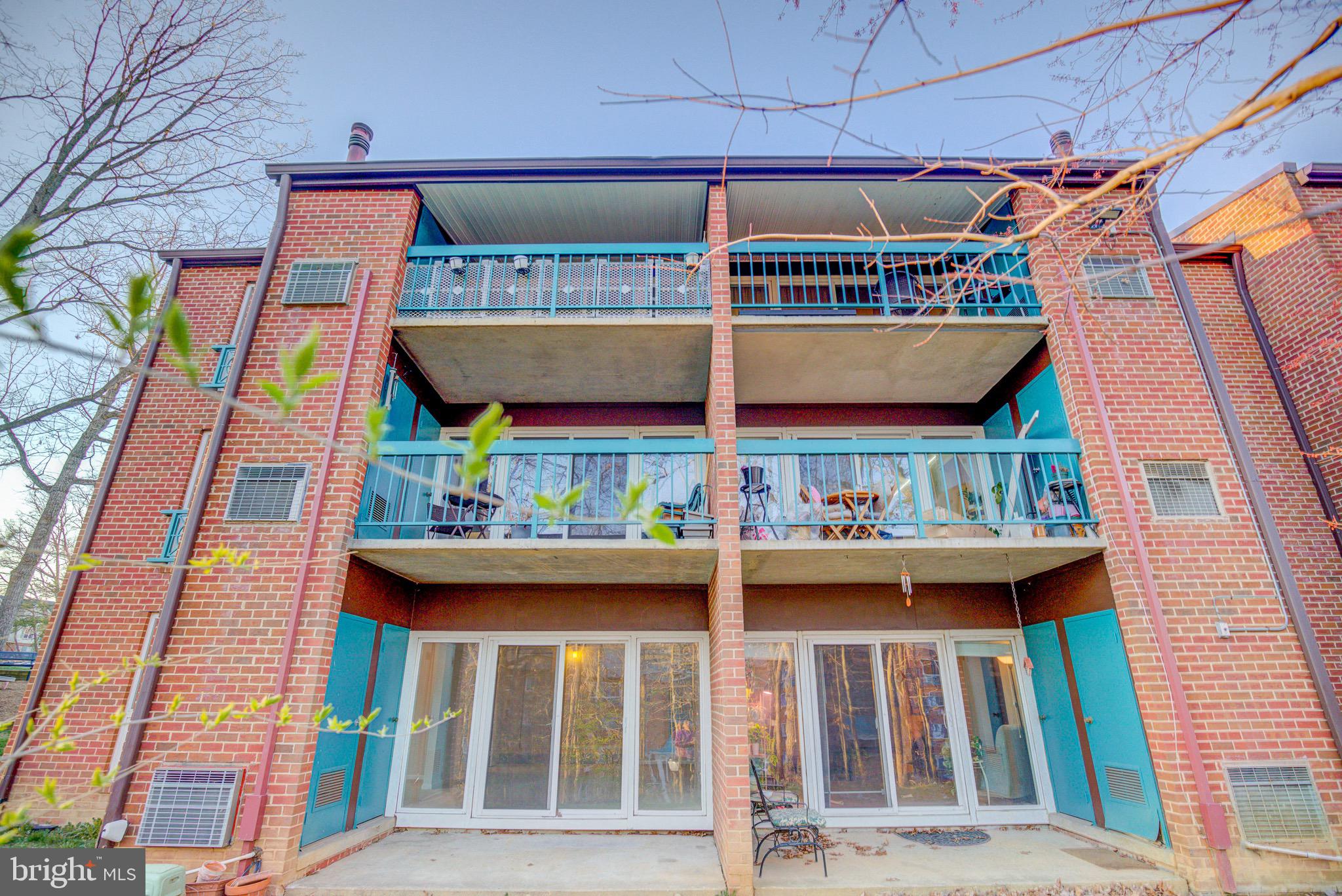 11813 Breton Court, Unit 2B Reston, VA 20191 - Photo 16 of 17 a view of a brick building with a window