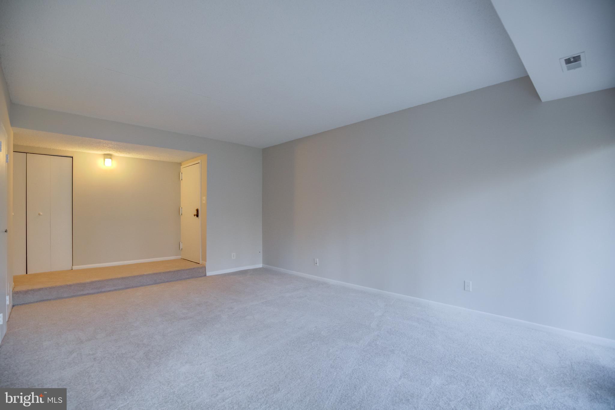 11813 Breton Court, Unit 2B Reston, VA 20191 - Photo 3 of 17 a view of an empty room