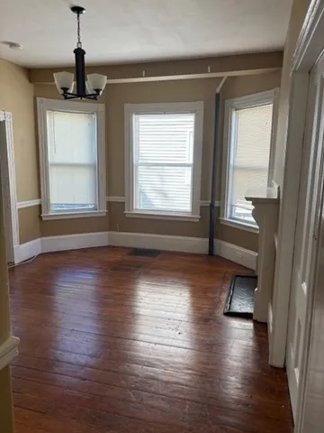 a view of a bedroom with window