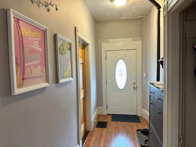 a kitchen with stainless steel appliances a refrigerator sink and microwave