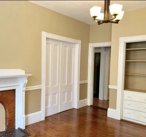 a view of a backyard with furniture and a table