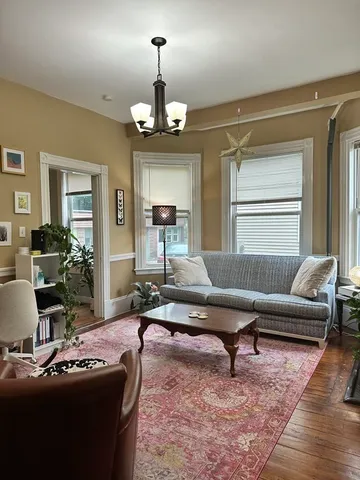 a kitchen with stainless steel appliances a microwave a stove and refrigerator
