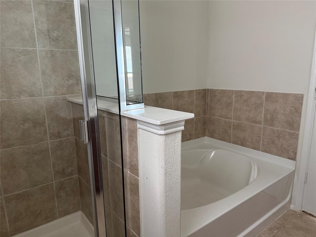 2225 Heaton Street Forney, TX 75126 - Photo 15 of 21 Separate tub and shower.