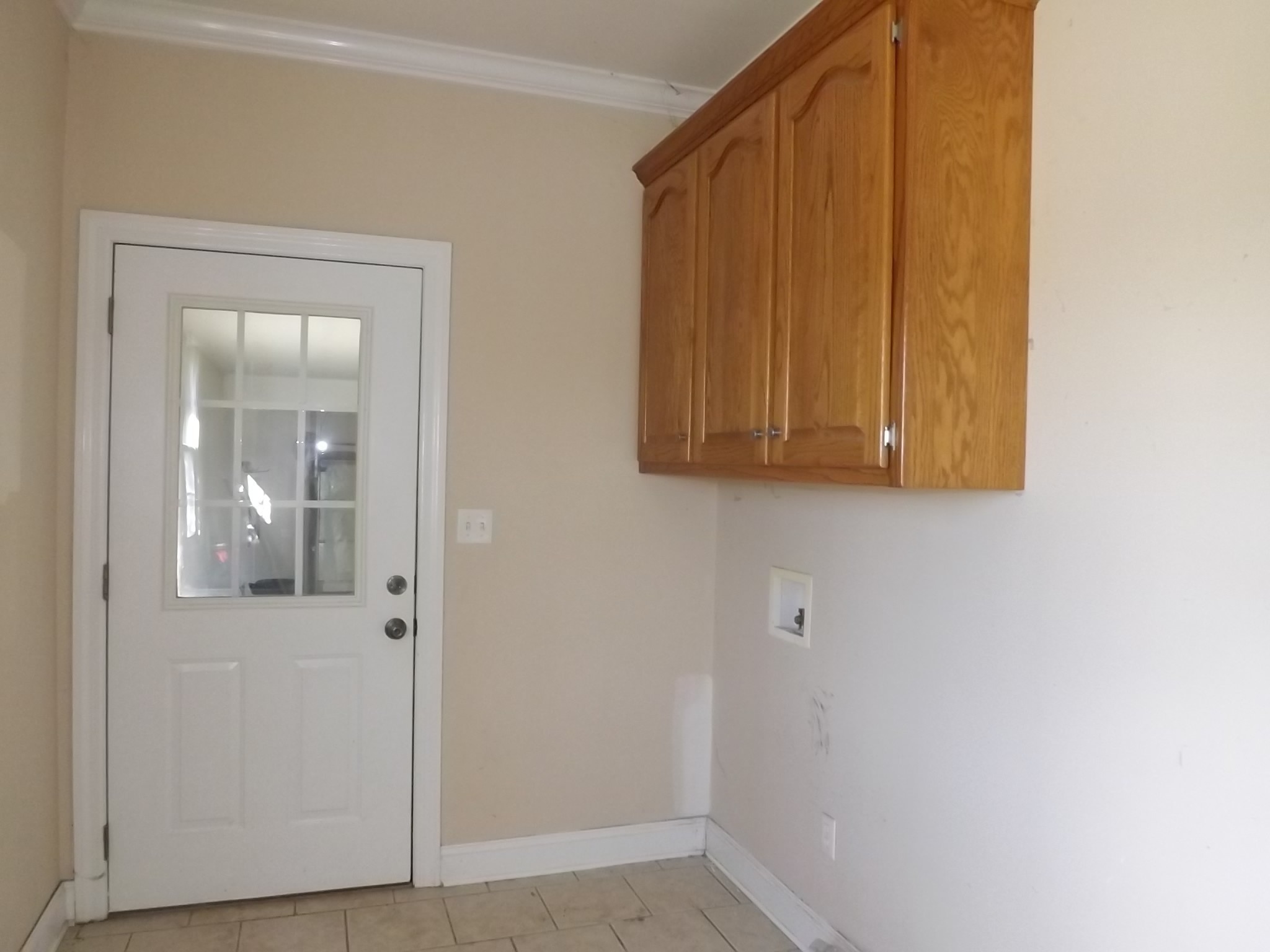 4074 Gum Creek Road Decherd, TN 37324 - Photo 16 of 17 a view of a small space with wooden floor and a mirror