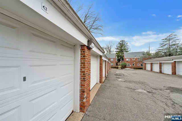 a view of a house with a street