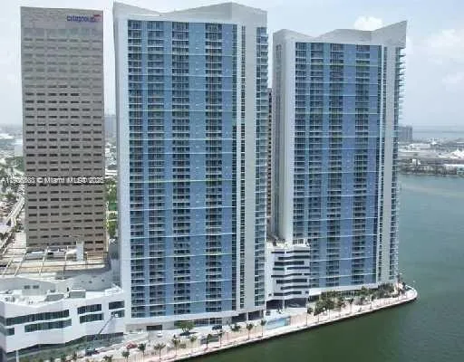 a view of balcony with a potted plants