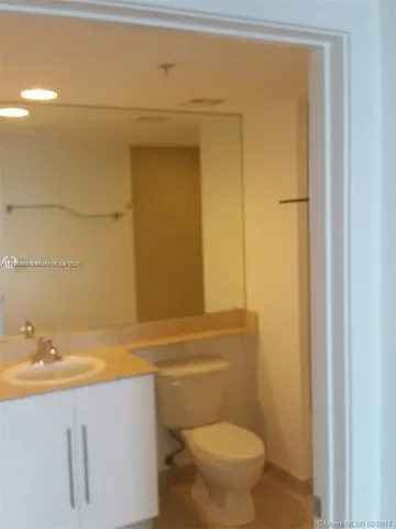 a bathroom with a sink and a toilet