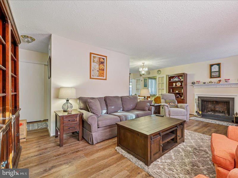 3703 Liverpool Place, Unit 37A Silver Spring, MD 20906 - Photo 2 of 34 Living room with fireplace