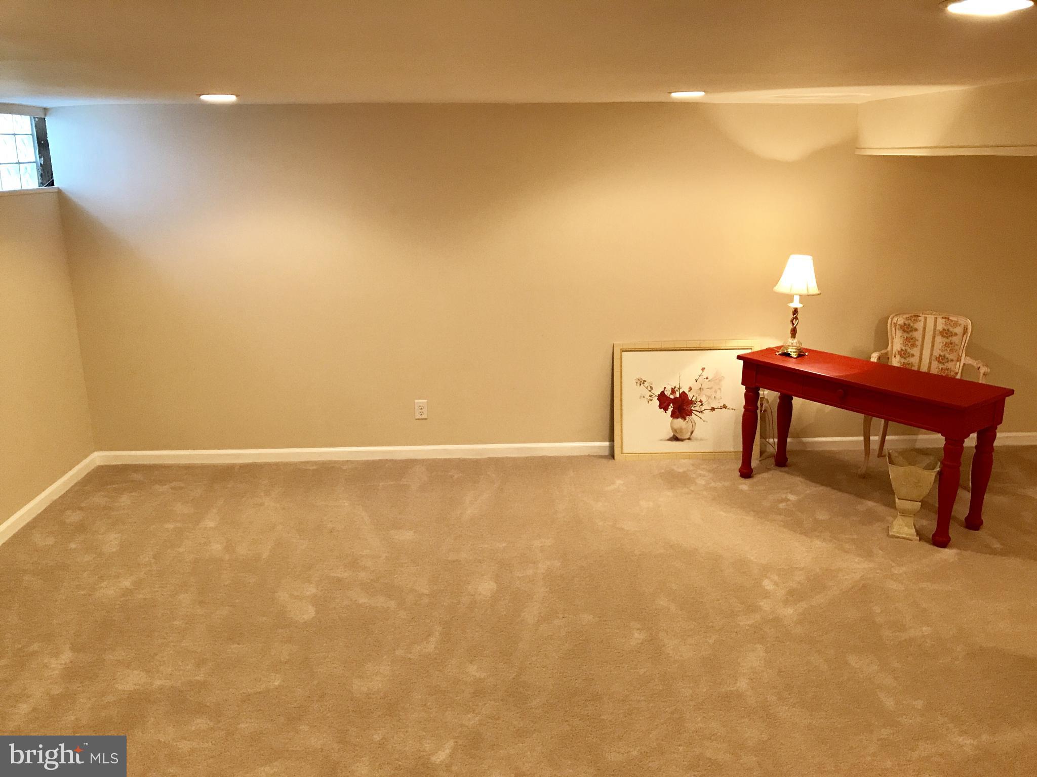 1713 Heathfield Road Baltimore, MD 21239 - Photo 19 of 26 a view of a room with table and chair