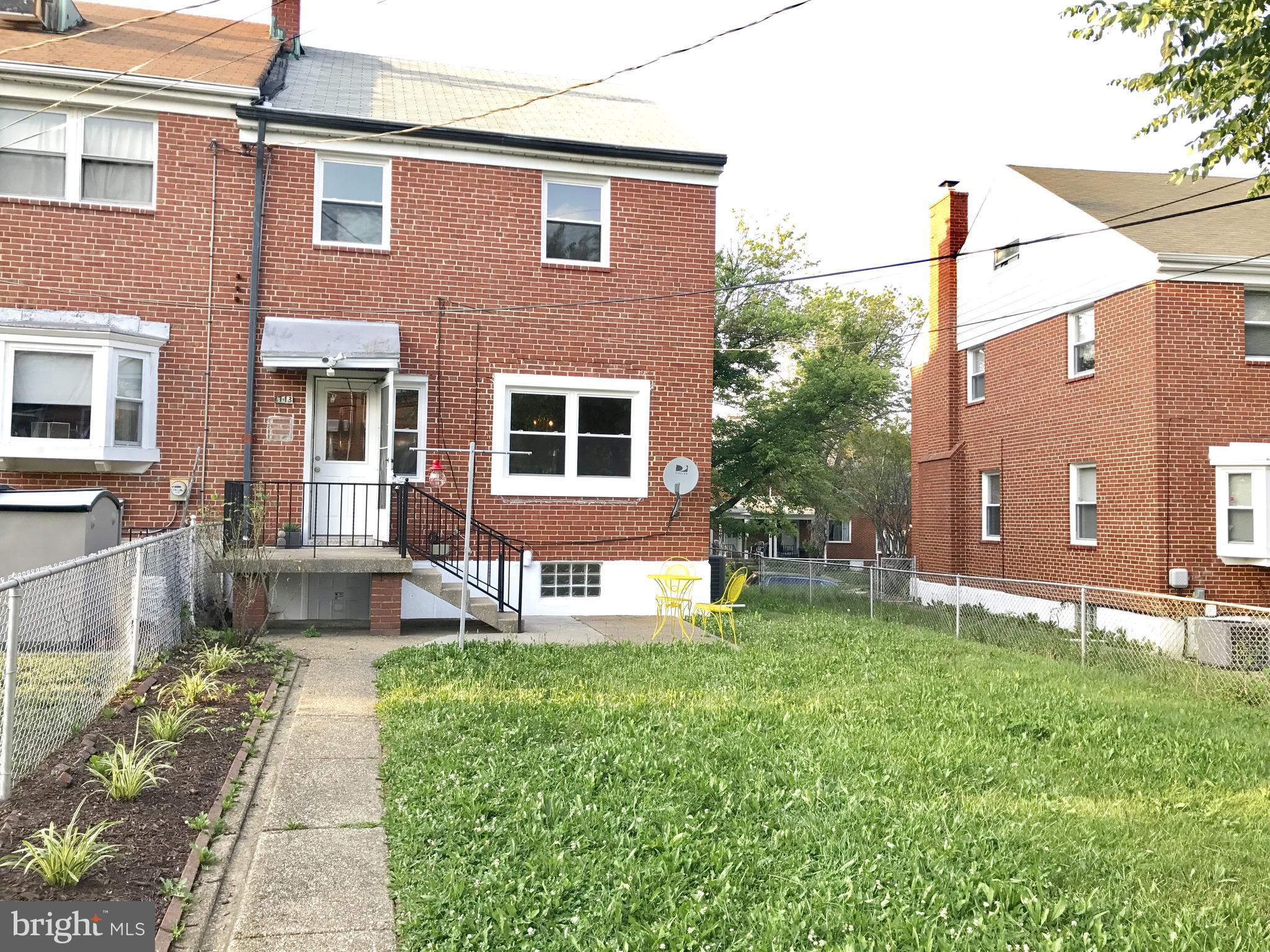 1713 Heathfield Road Baltimore, MD 21239 - Photo 22 of 26 a house view with a sitting space and garden