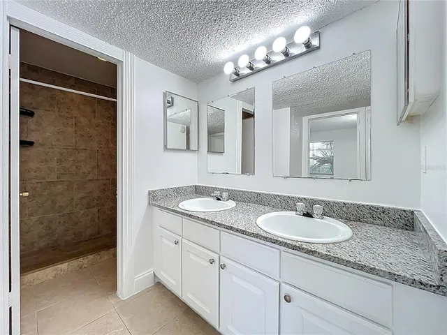 a bathroom with a shower and a toilet