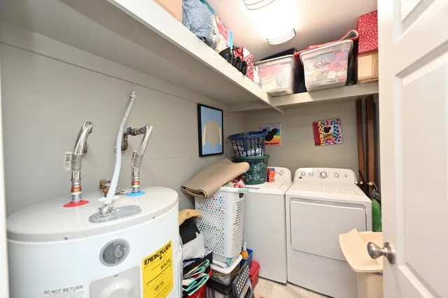 a bathroom with a sink double vanity and a mirror